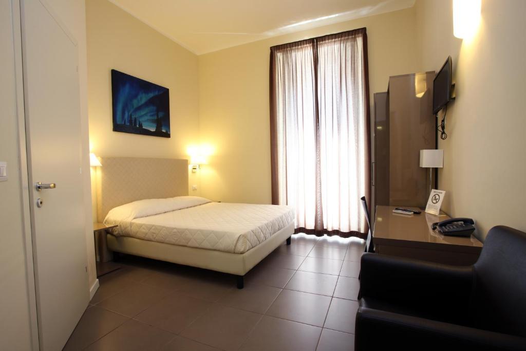 Hotel Ferton Milão Quarto foto