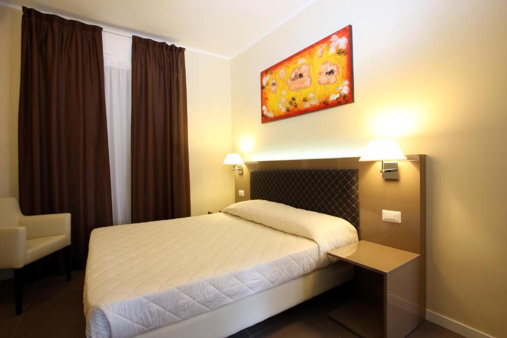 Hotel Ferton Milão Quarto foto