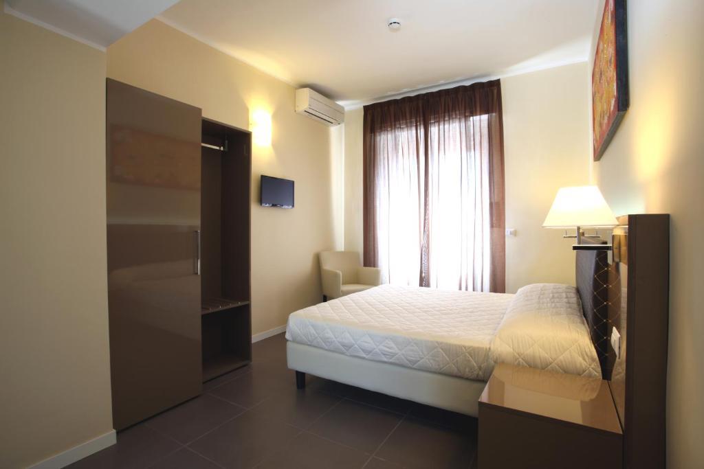 Hotel Ferton Milão Quarto foto