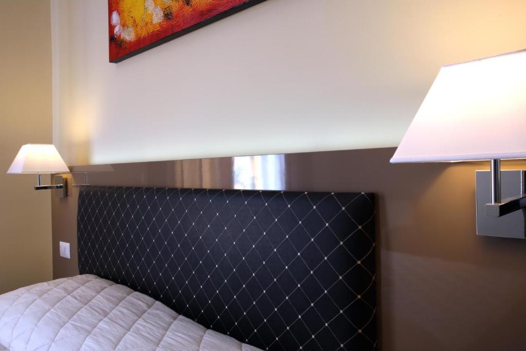 Hotel Ferton Milão Quarto foto